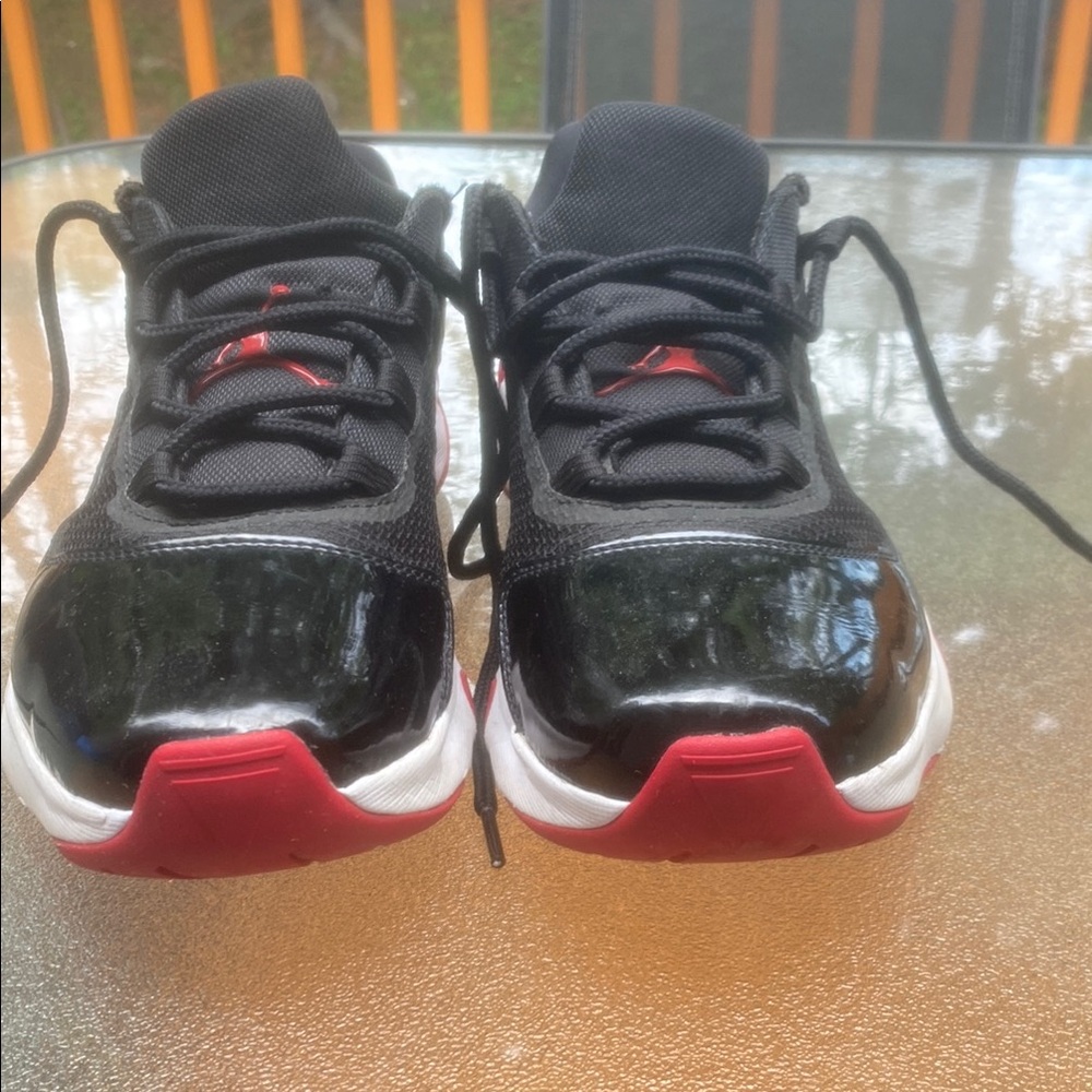 Jordan Black and Red Sneakers with Classic Silhouette